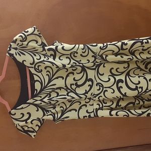 I'm selling this yellow and blue dress. I bought it because it was cute.